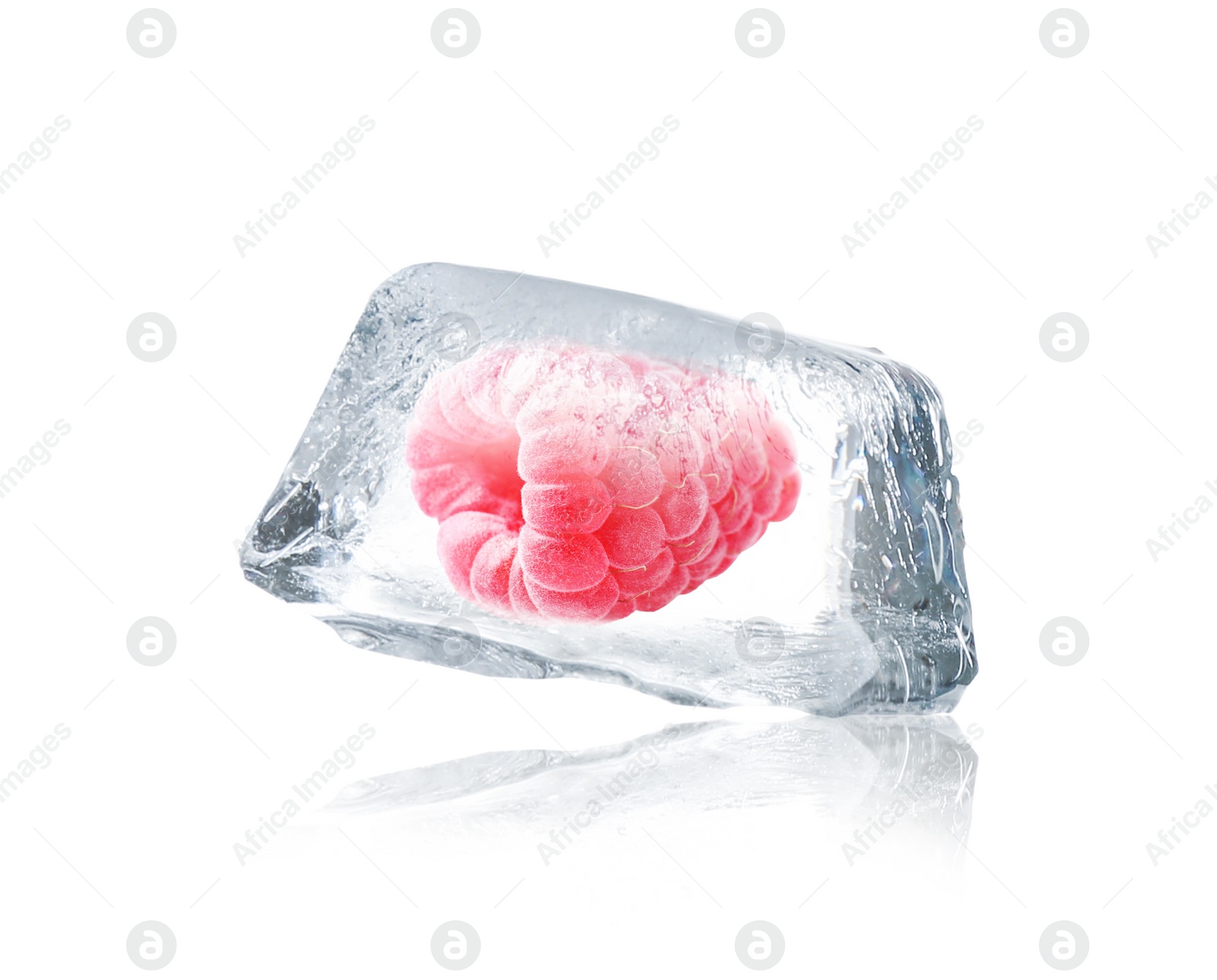 Image of Delicious raspberry frozen in ice isolated on white 