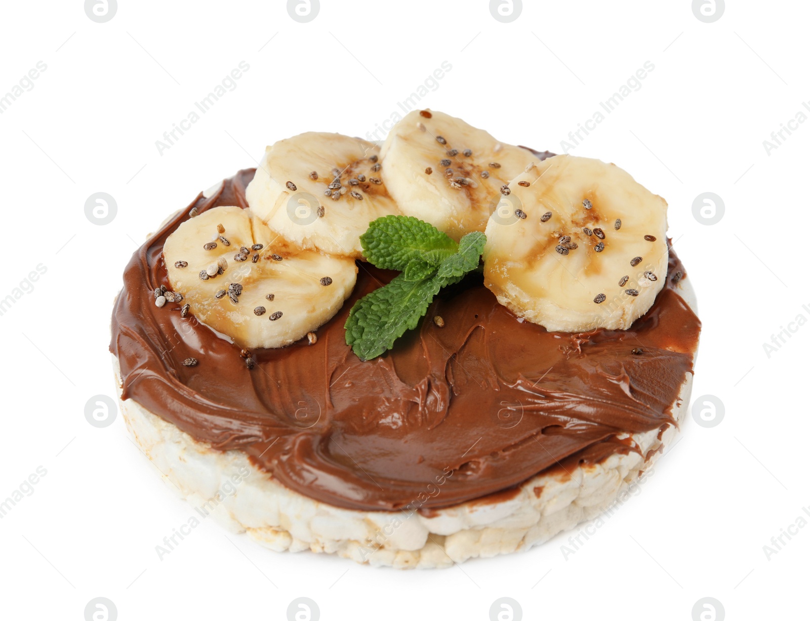 Photo of Puffed rice cake with chocolate spread, banana and mint isolated on white