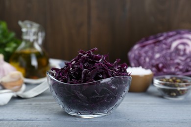 Photo of Tasty red cabbage sauerkraut on light grey wooden table