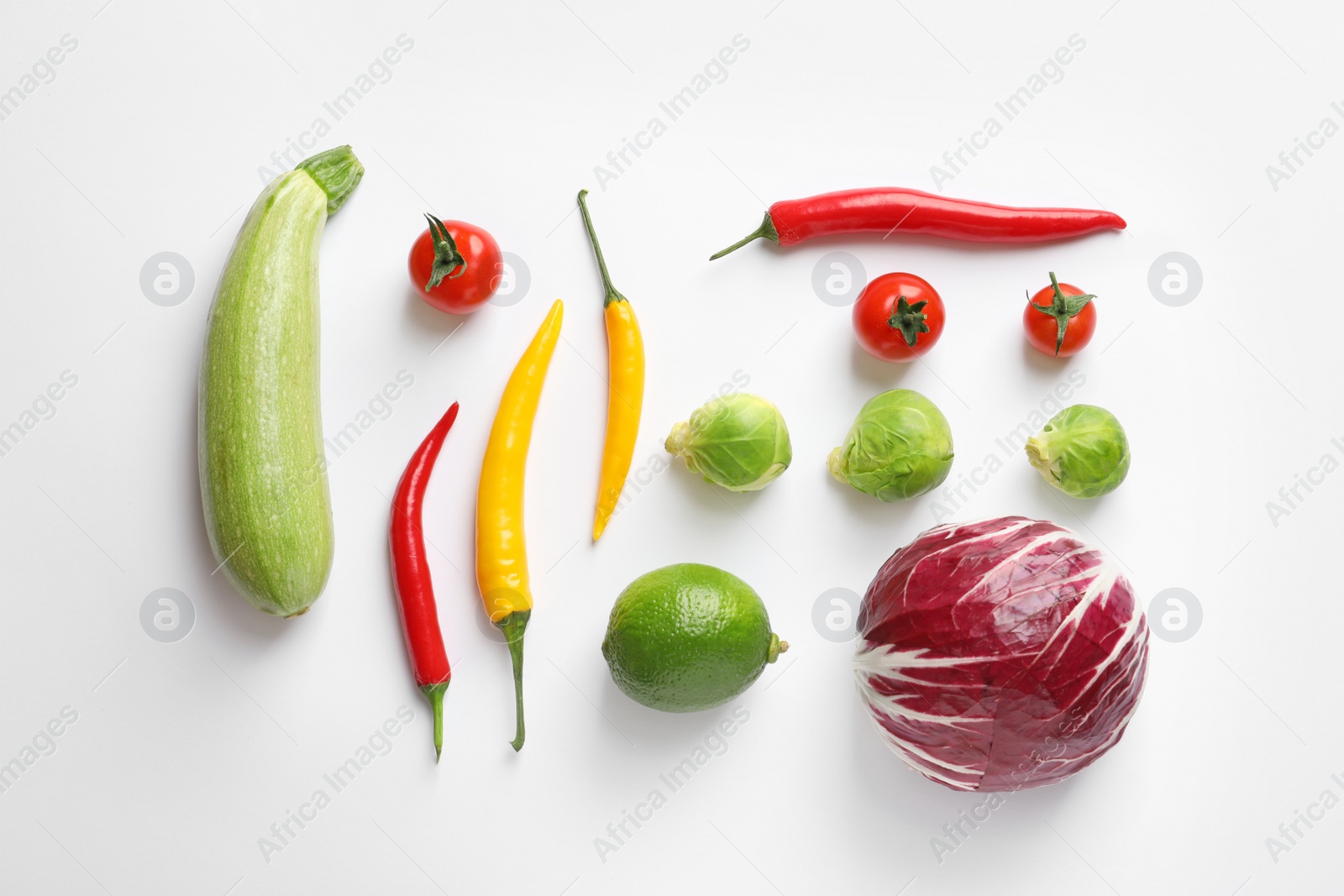 Photo of Fresh vegetables and fruit on white background, top view