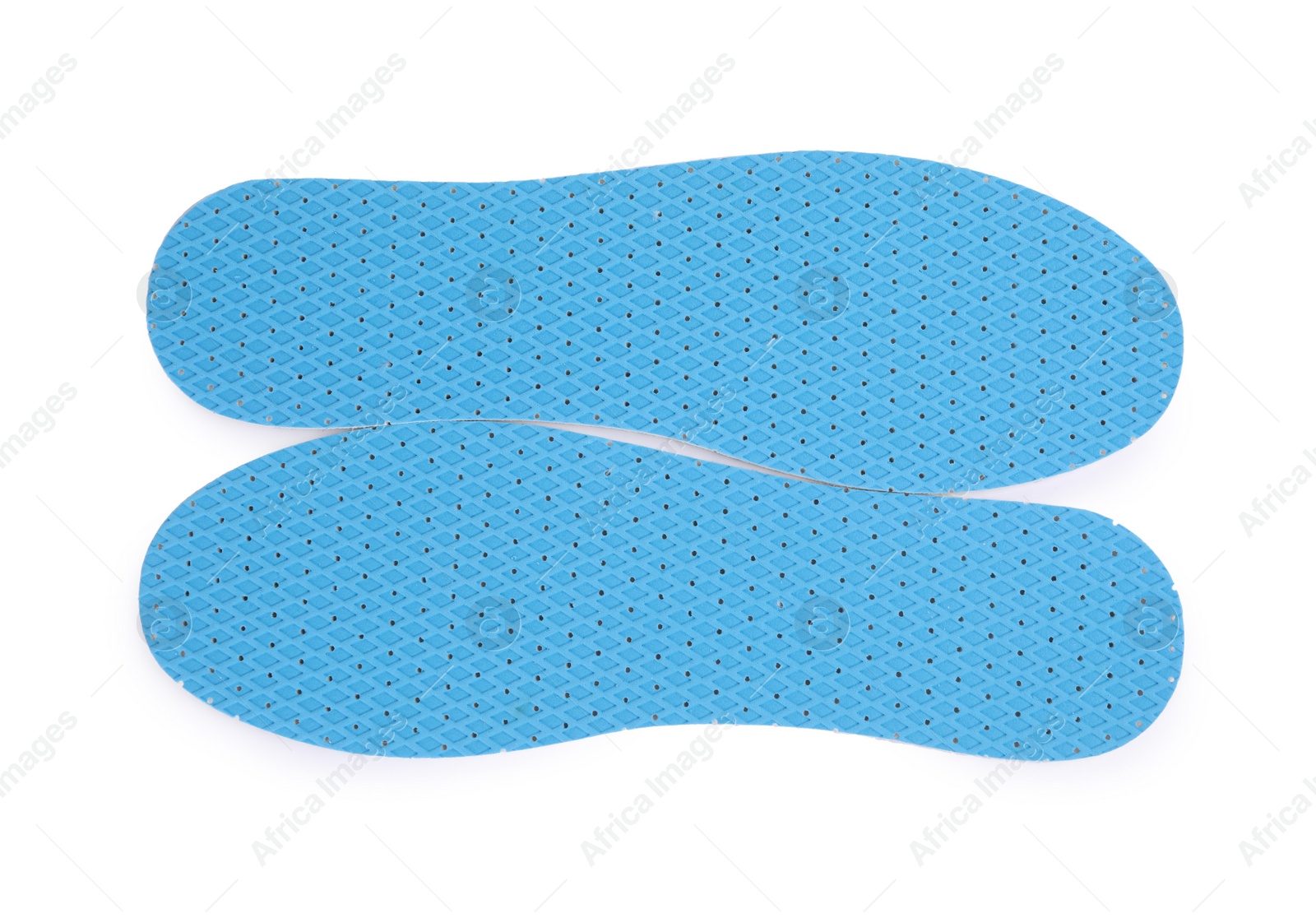 Photo of Pair of insoles on white background, top view