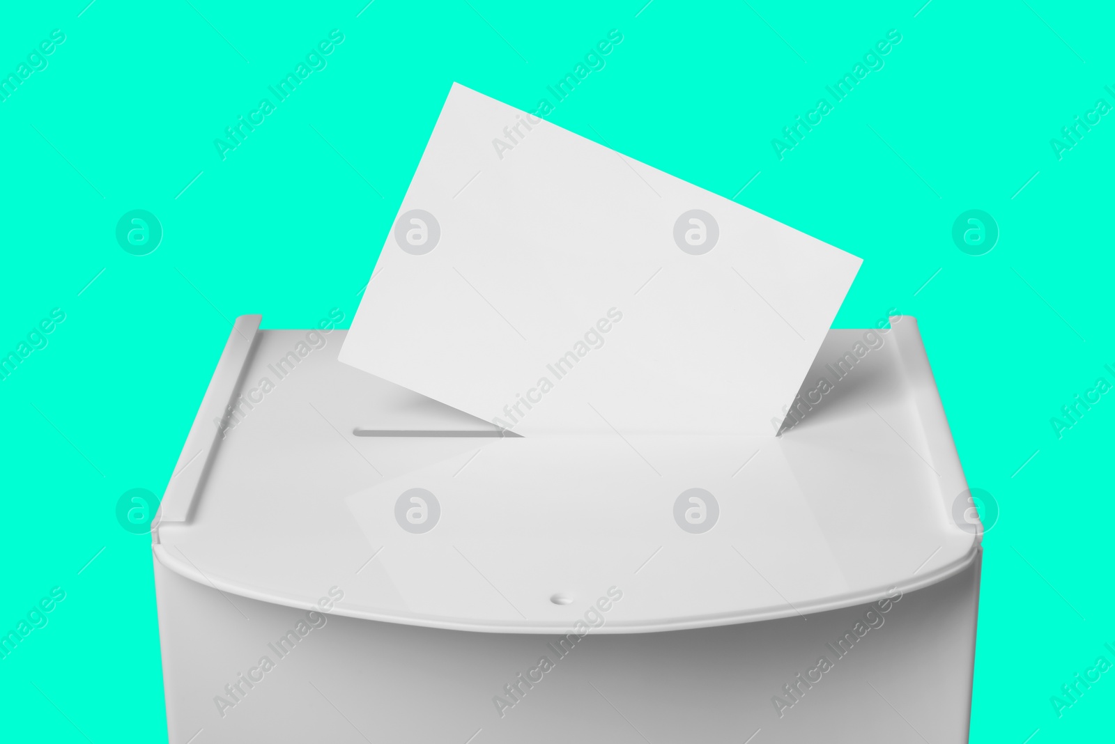Image of Ballot box with vote on turquoise background. Election time