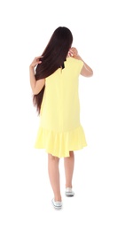 Photo of Brunette woman in yellow dress on white background, back view