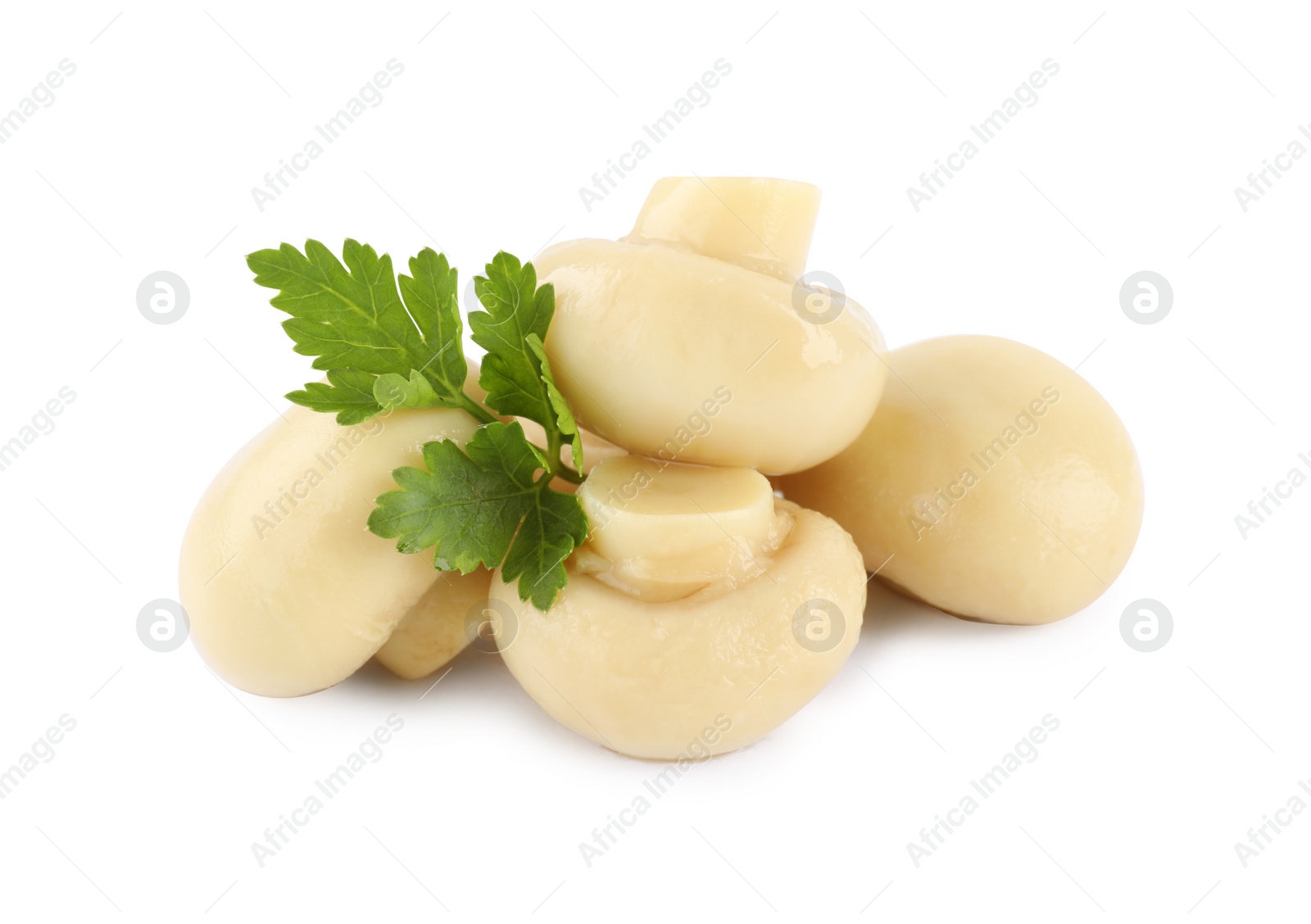 Photo of Delicious marinated mushrooms with parsley isolated on white