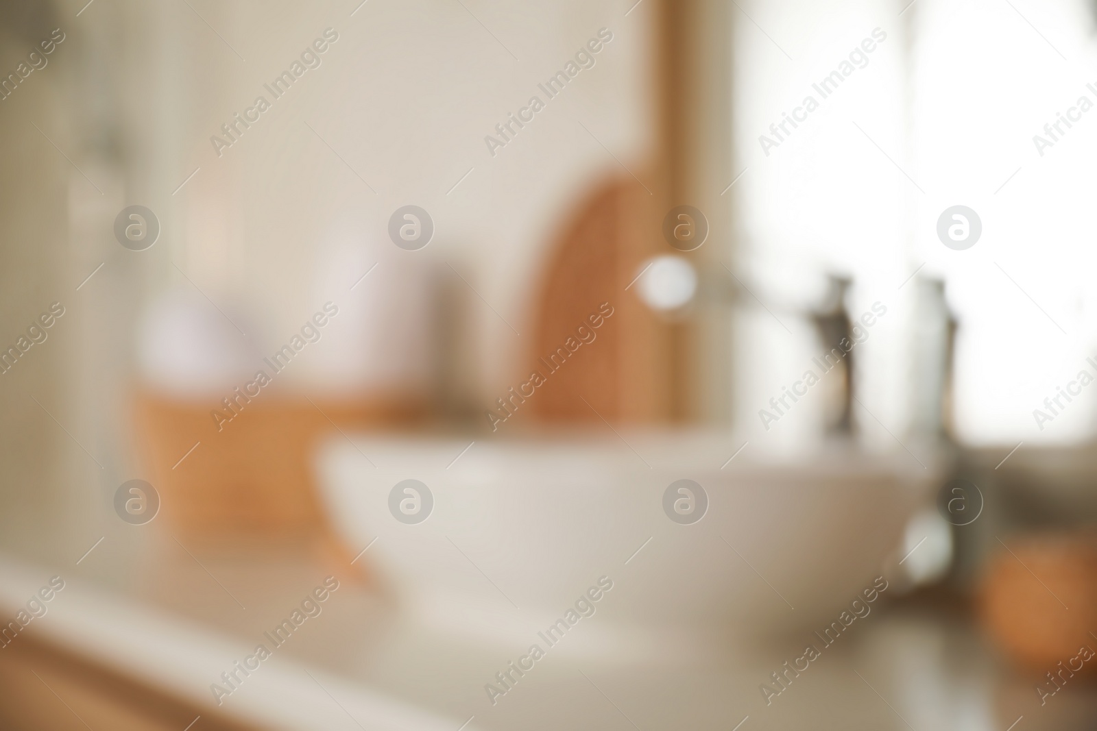 Photo of Blurred view of light modern bathroom interior