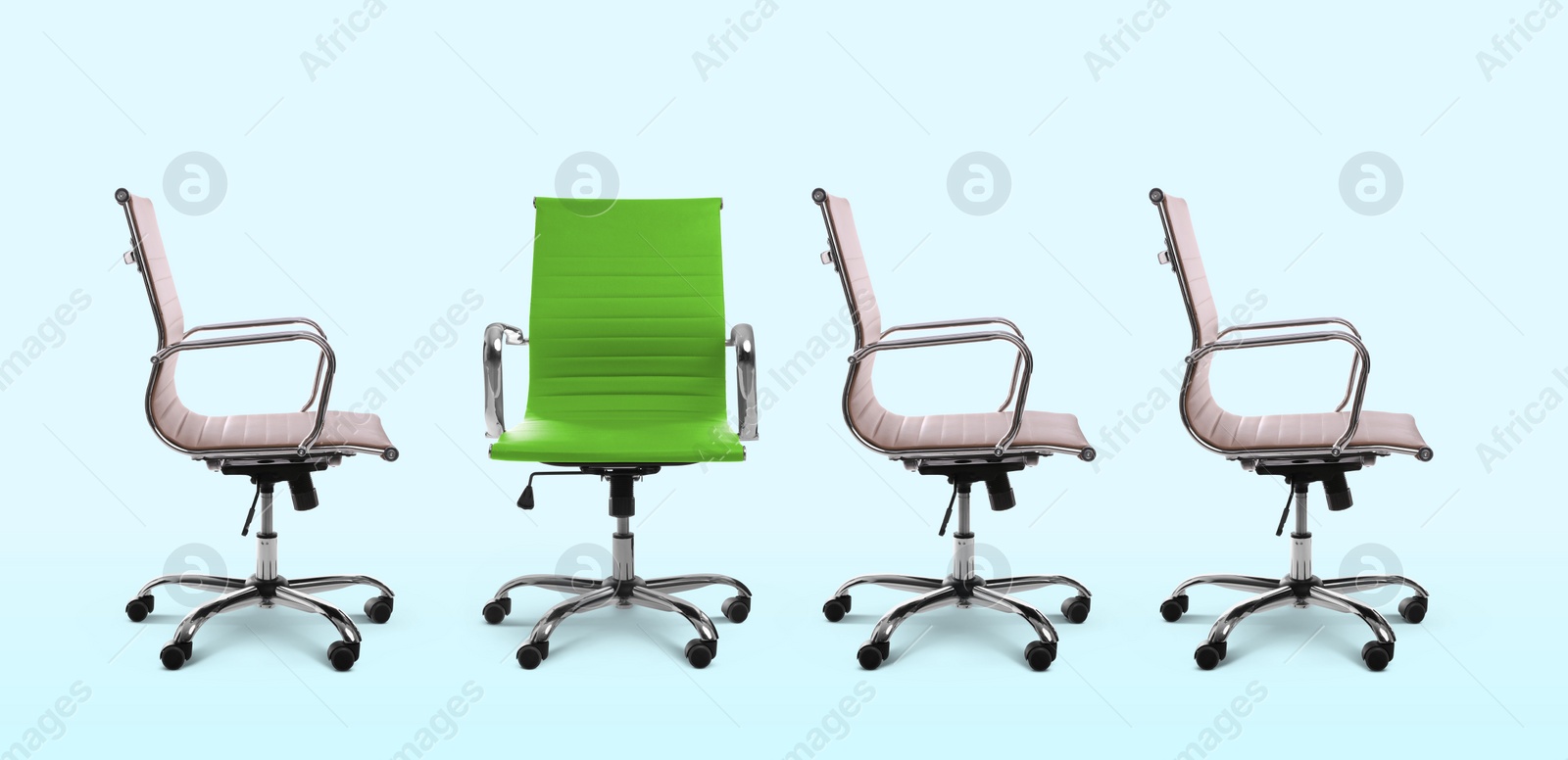 Image of Vacant position. Green office chair among another ones on light blue background, banner design