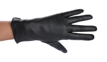 Photo of Woman wearing black leather glove on white background, closeup