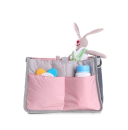 Photo of Maternity bag with baby accessories on white background
