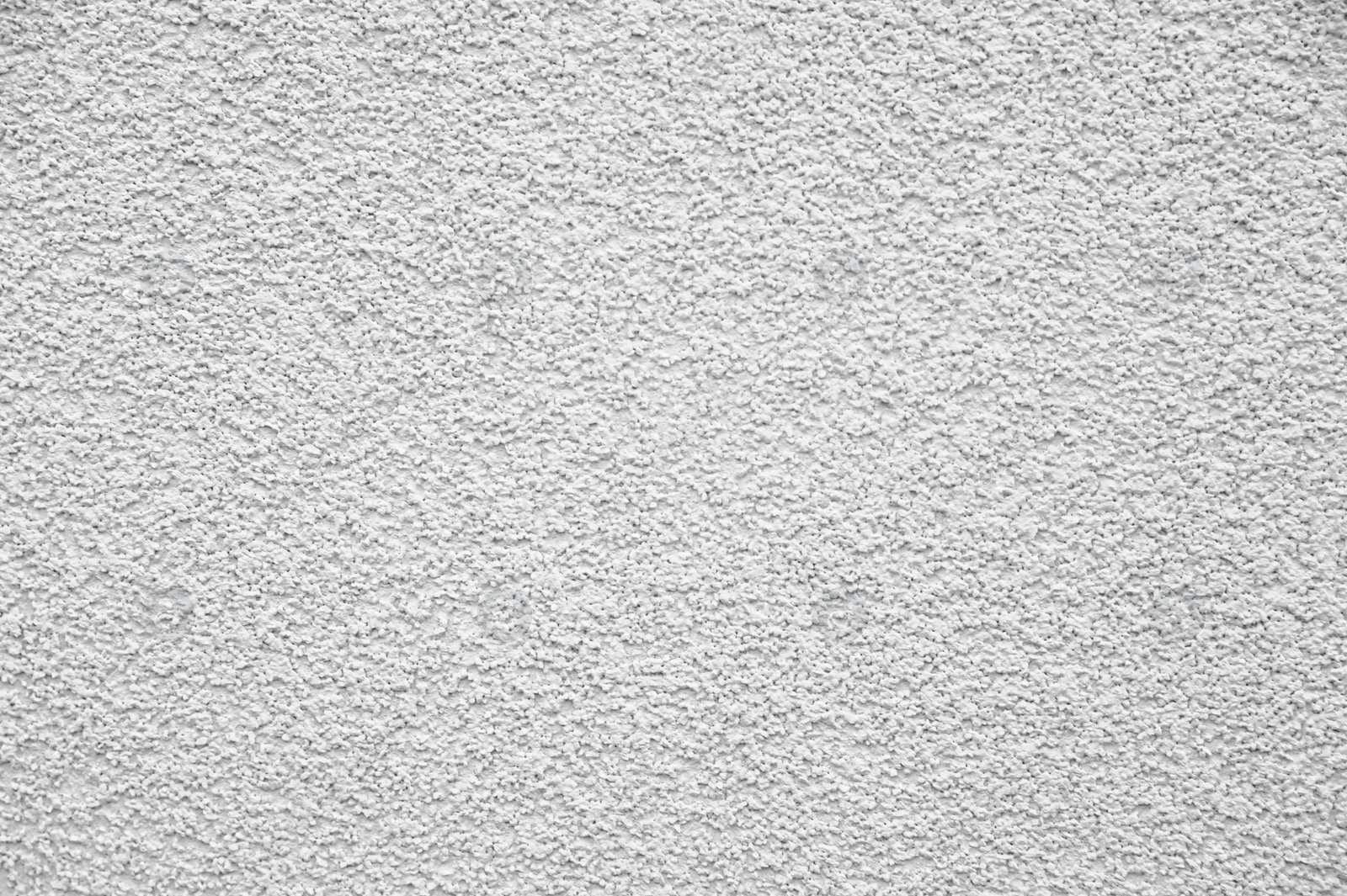 Photo of Texture of white plaster wall as background