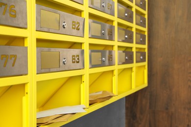 Metal mailboxes with keyholes, numbers and correspondence in post office