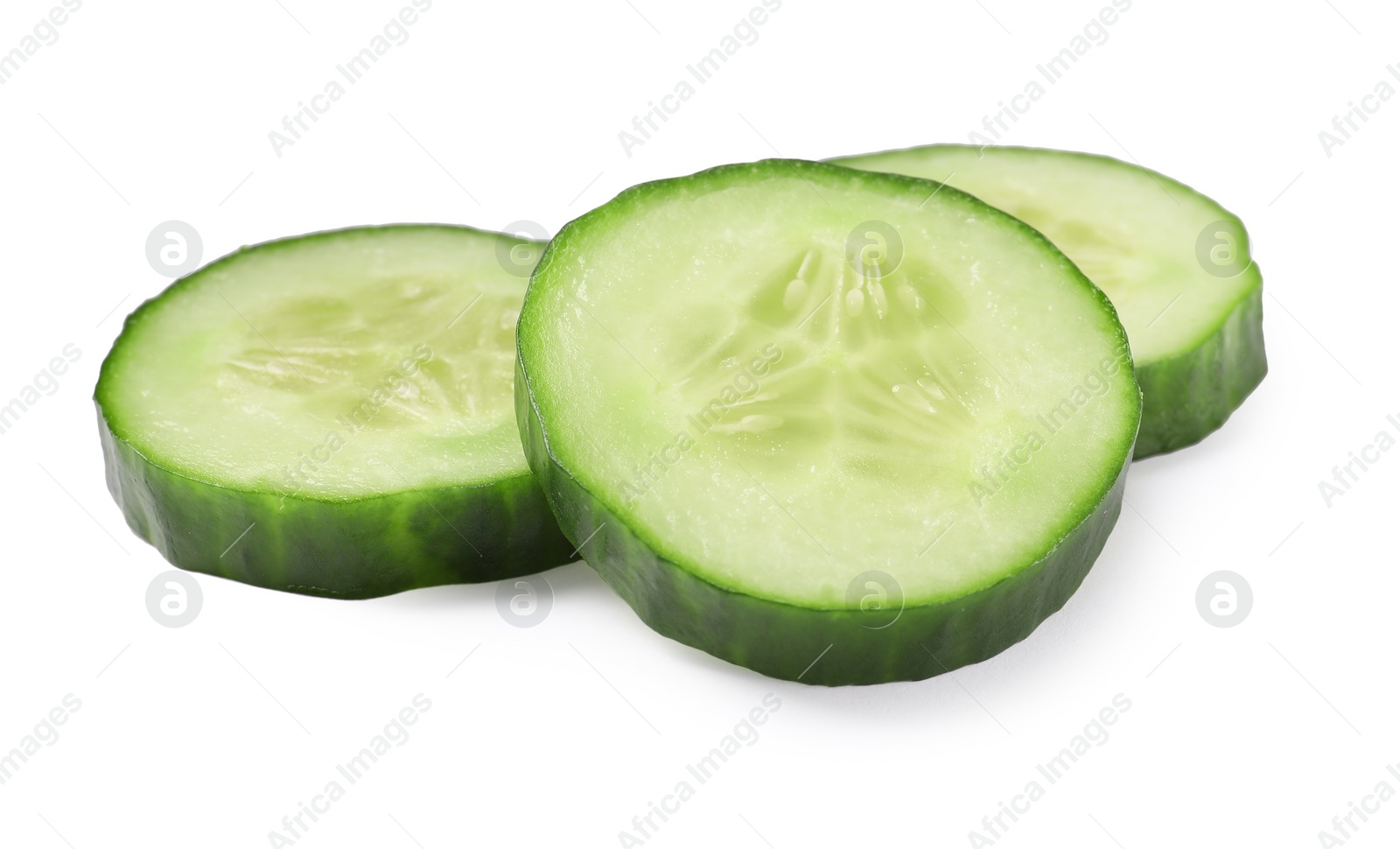 Photo of Slices of fresh cucumber isolated on white