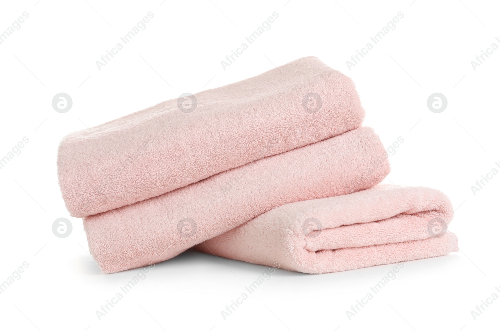 Photo of Stack of clean soft towels on white background