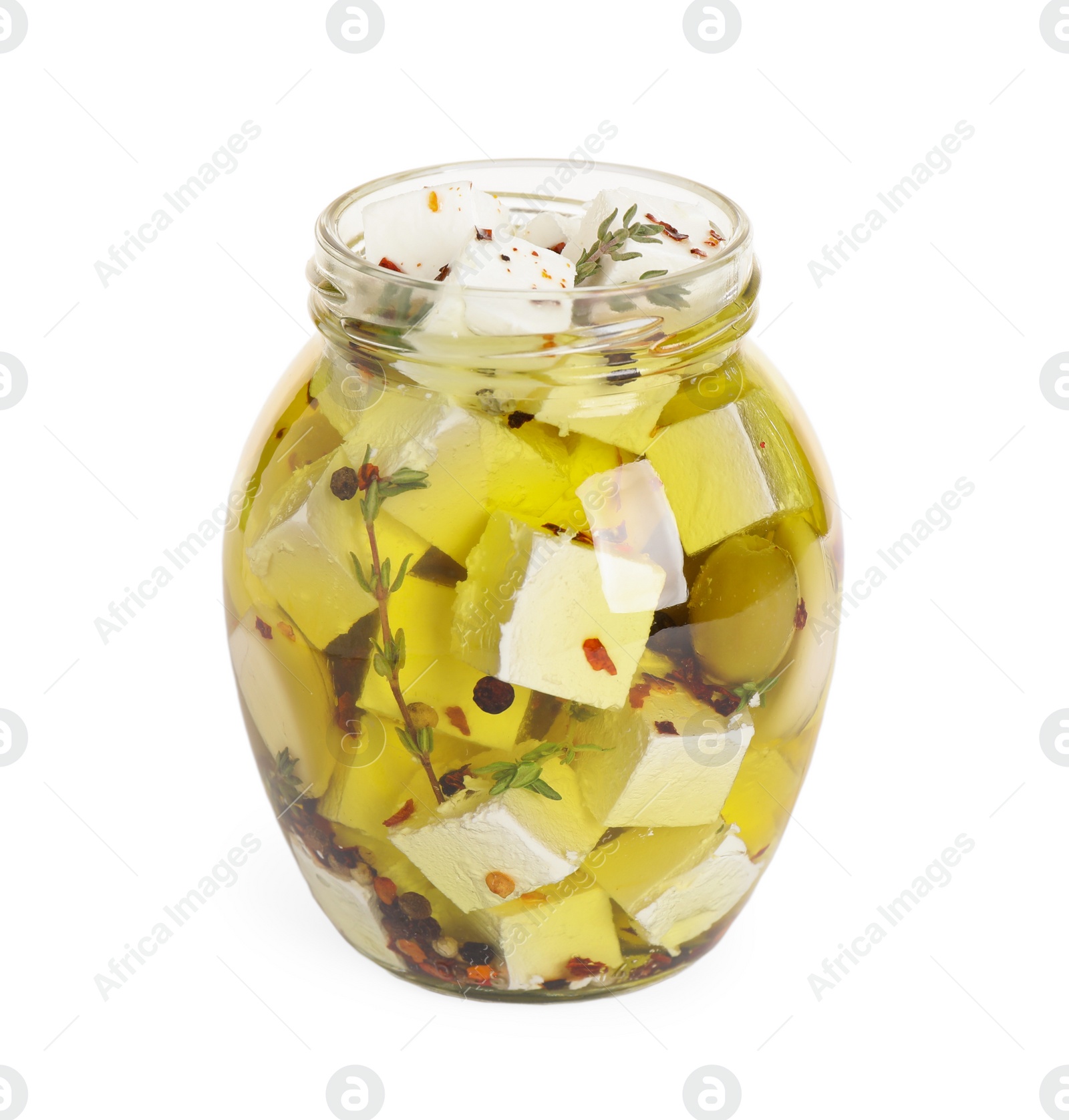 Photo of Open jar with feta cheese marinated in oil on white background. Pickled food