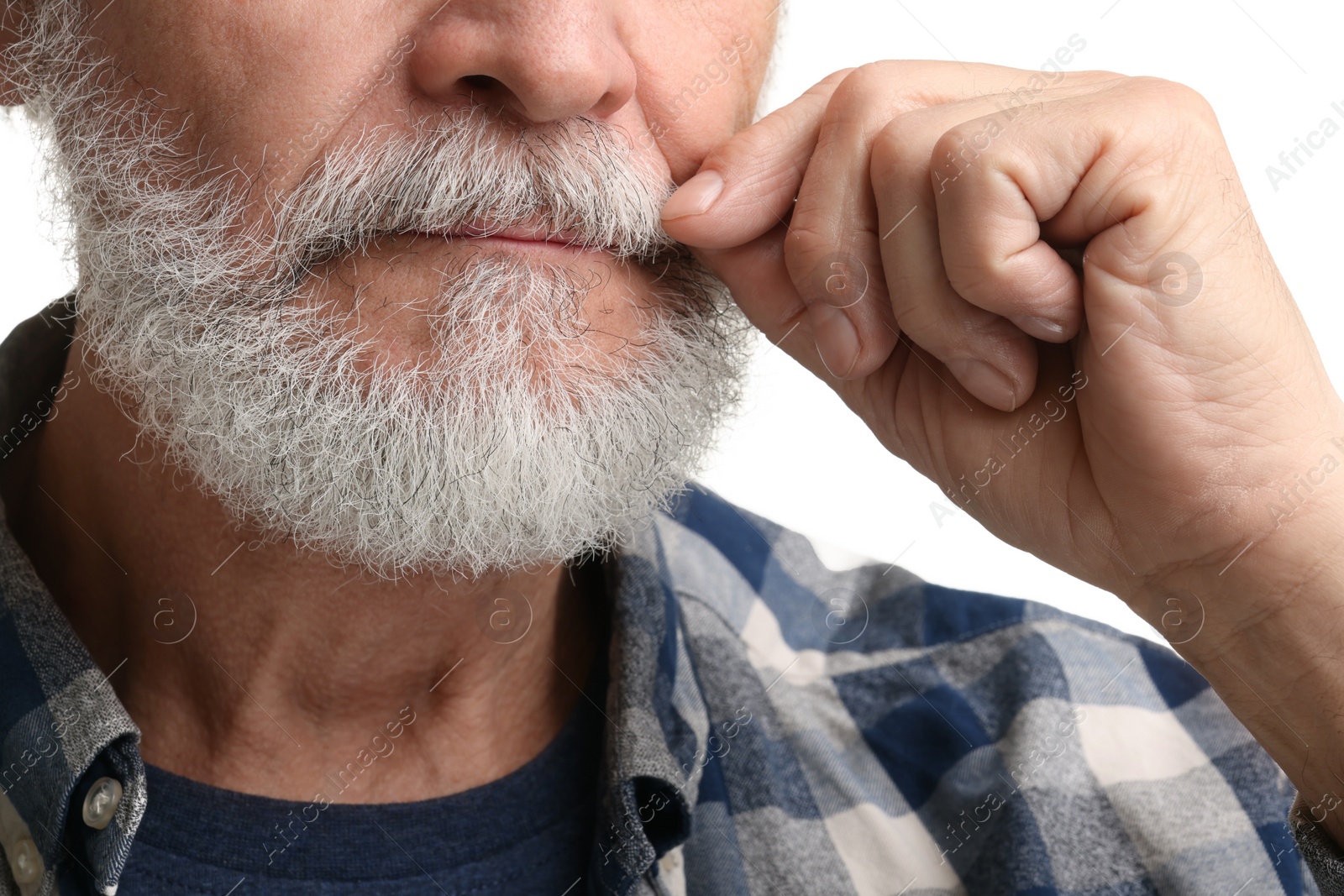 Photo of Man touching mustache on white background, closeup