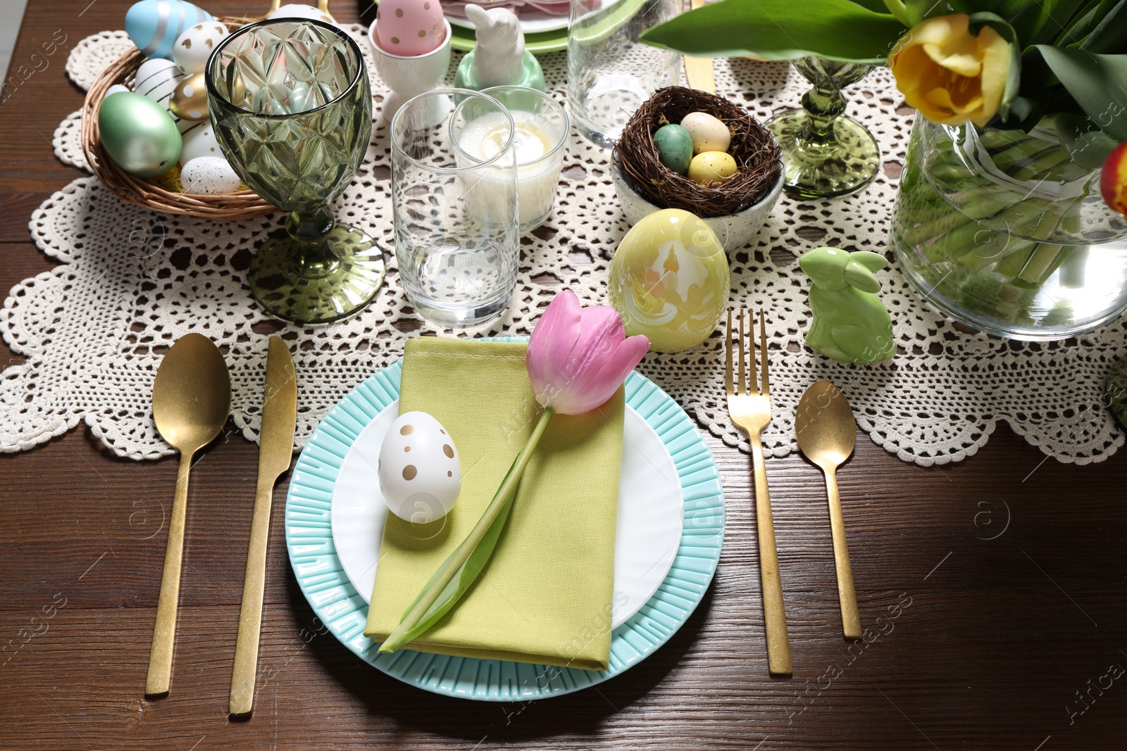 Photo of Festive table setting with beautiful flowers. Easter celebration