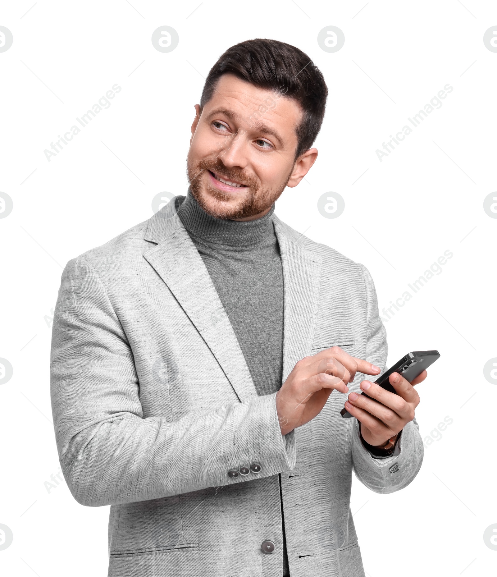 Photo of Handsome bearded businessman with smartphone on white background