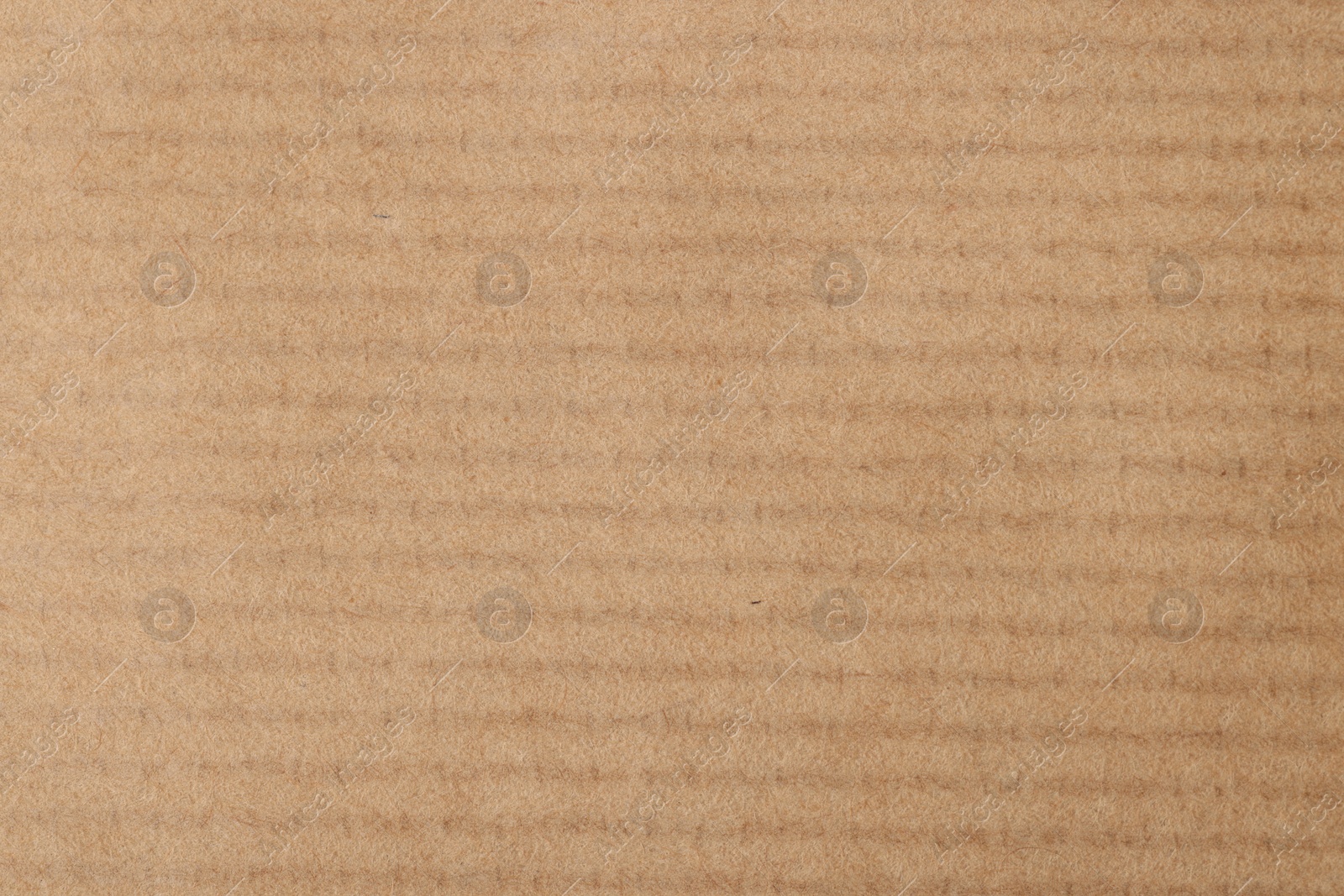 Photo of Texture of beige paper sheet as background, top view