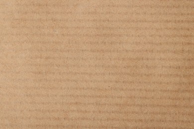 Texture of beige paper sheet as background, top view