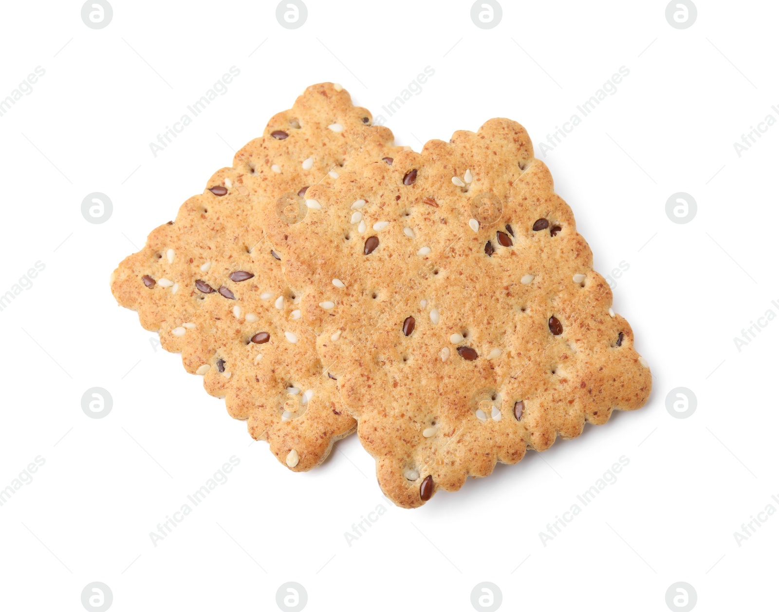 Photo of Cereal crackers with flax and sesame seeds isolated on white, above view