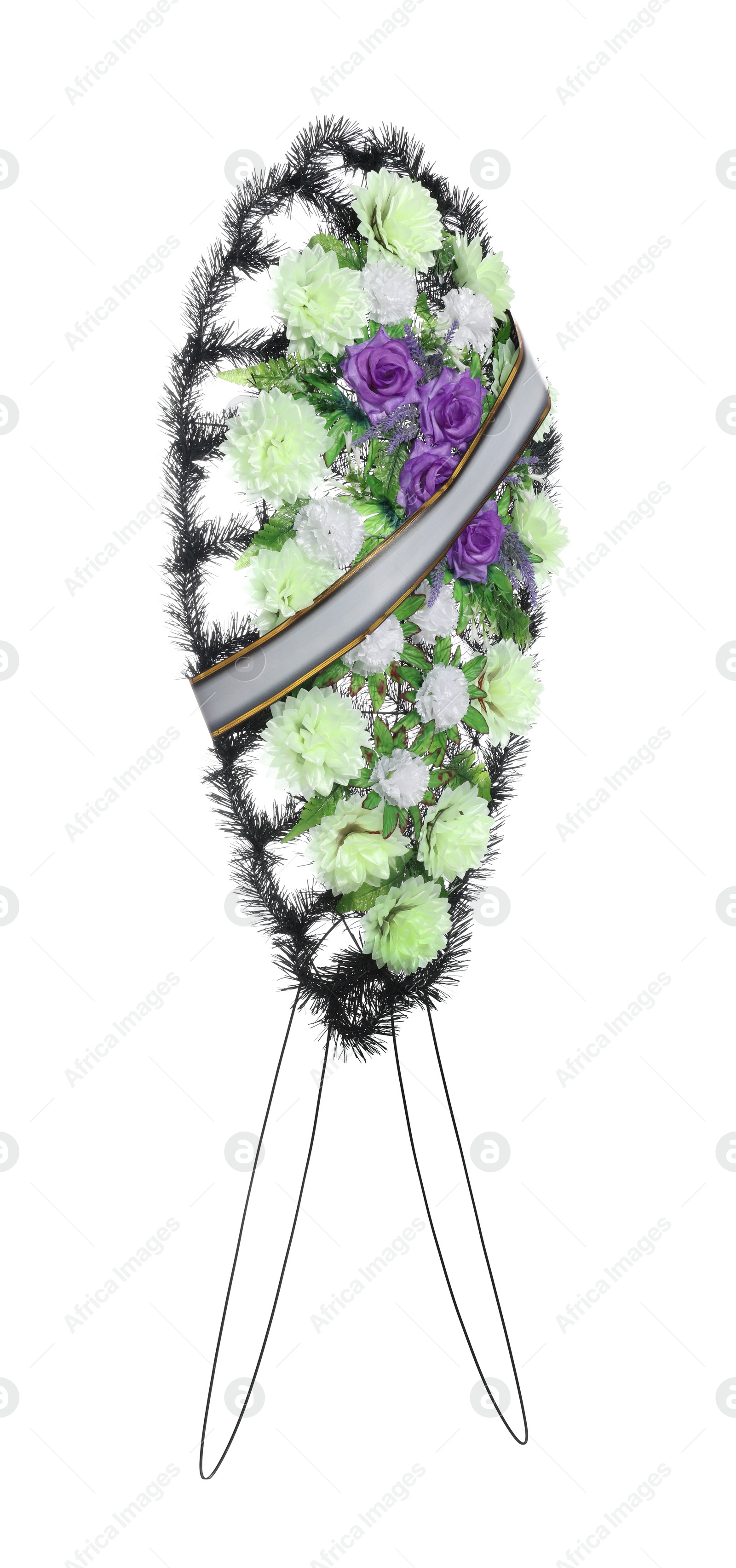 Photo of Funeral wreath of plastic flowers against white background