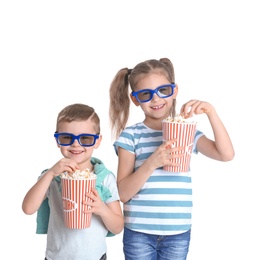 Photo of Cute children with popcorn and glasses on white background