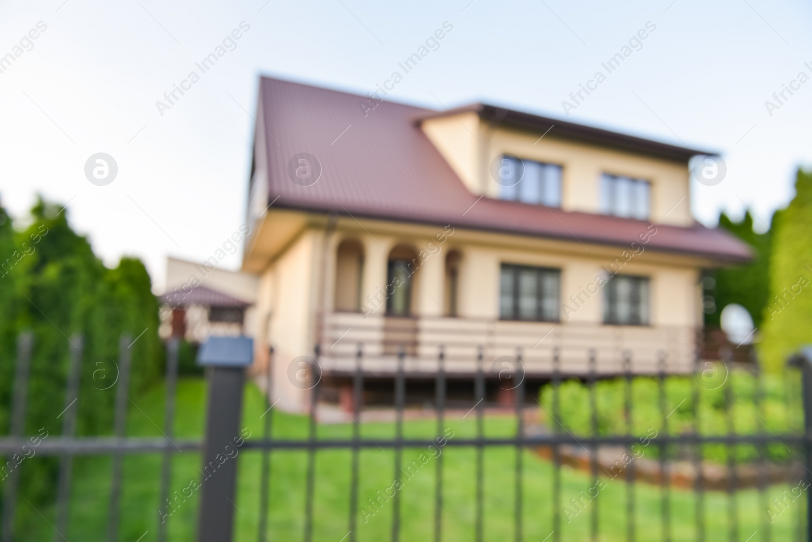 Photo of Blurred view of modern house and beautiful garden