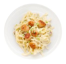 Photo of Delicious scallop pasta with onion isolated on white, top view