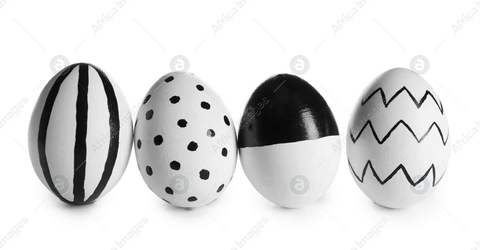 Photo of Painted Easter eggs on white background. Stylish design