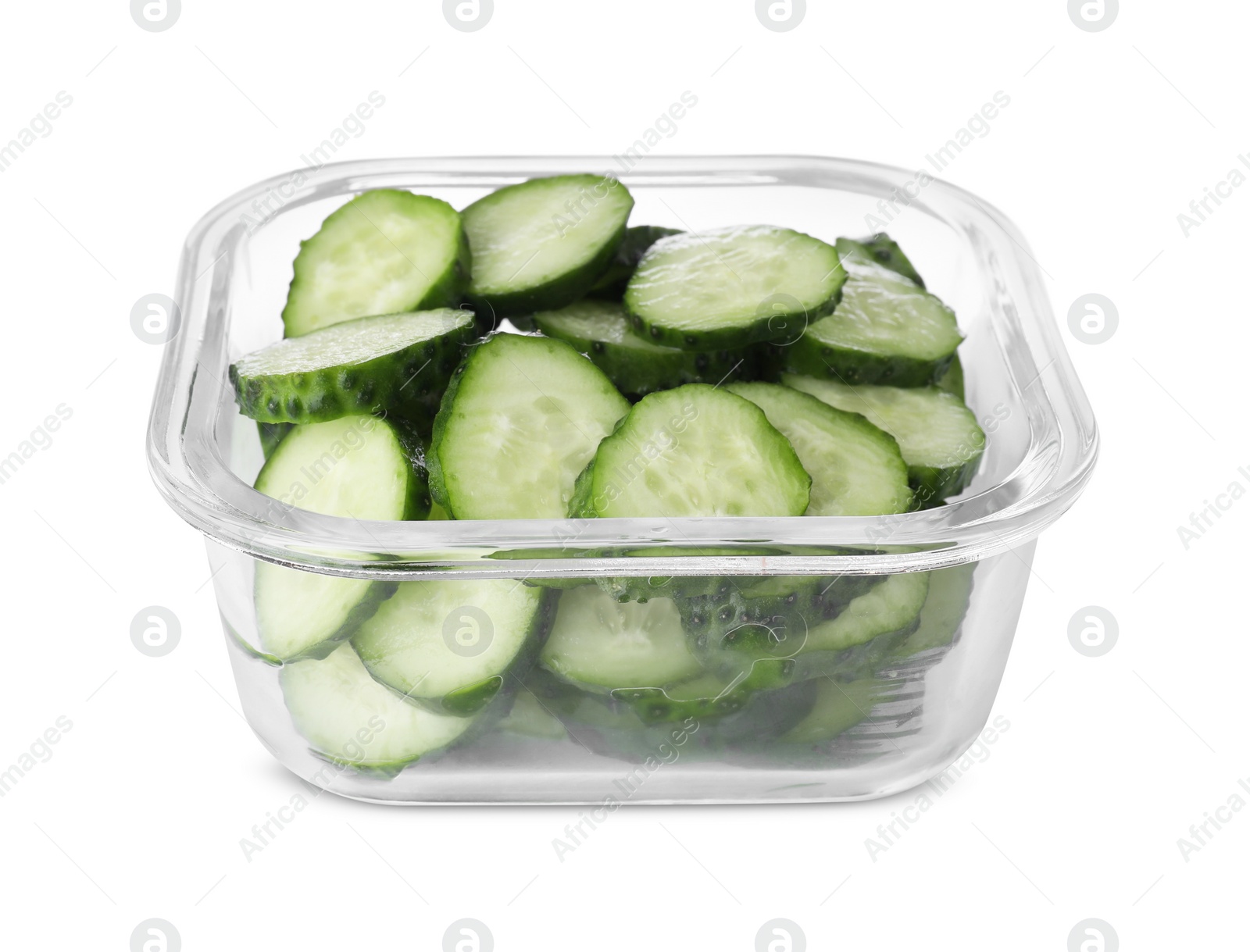 Photo of Glass container with fresh cut cucumbers isolated on white