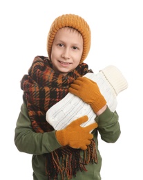Photo of Ill boy with hot water bottle suffering from cold on white background