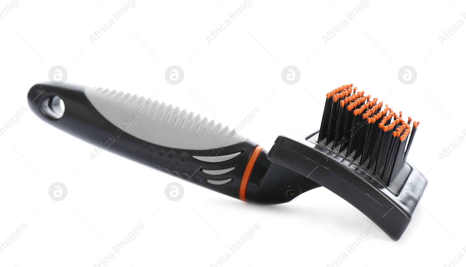 Photo of Brush for cat on white background. Pet care