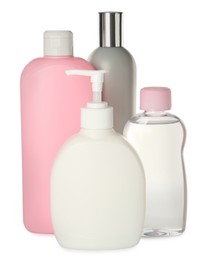 Photo of Bottles of baby cosmetic products on white background