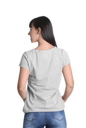 Photo of Young woman in grey t-shirt on white background. Mockup for design