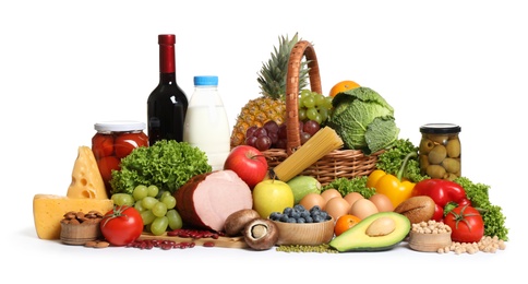 Different food products on white background. Balanced diet