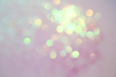 Photo of Shiny lilac background with magical bokeh effect