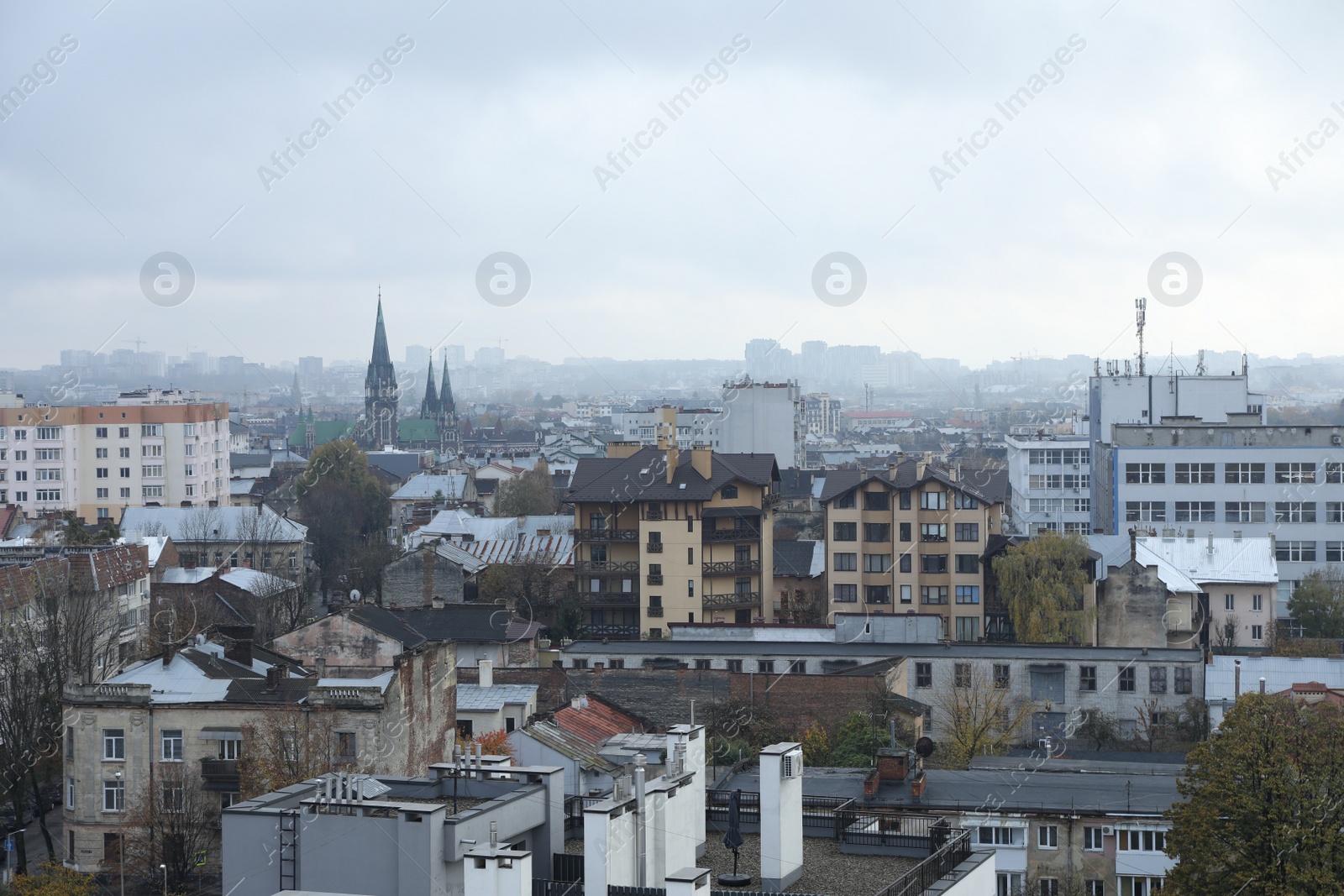 Photo of City with many different buildings under beautiful sky