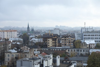 City with many different buildings under beautiful sky