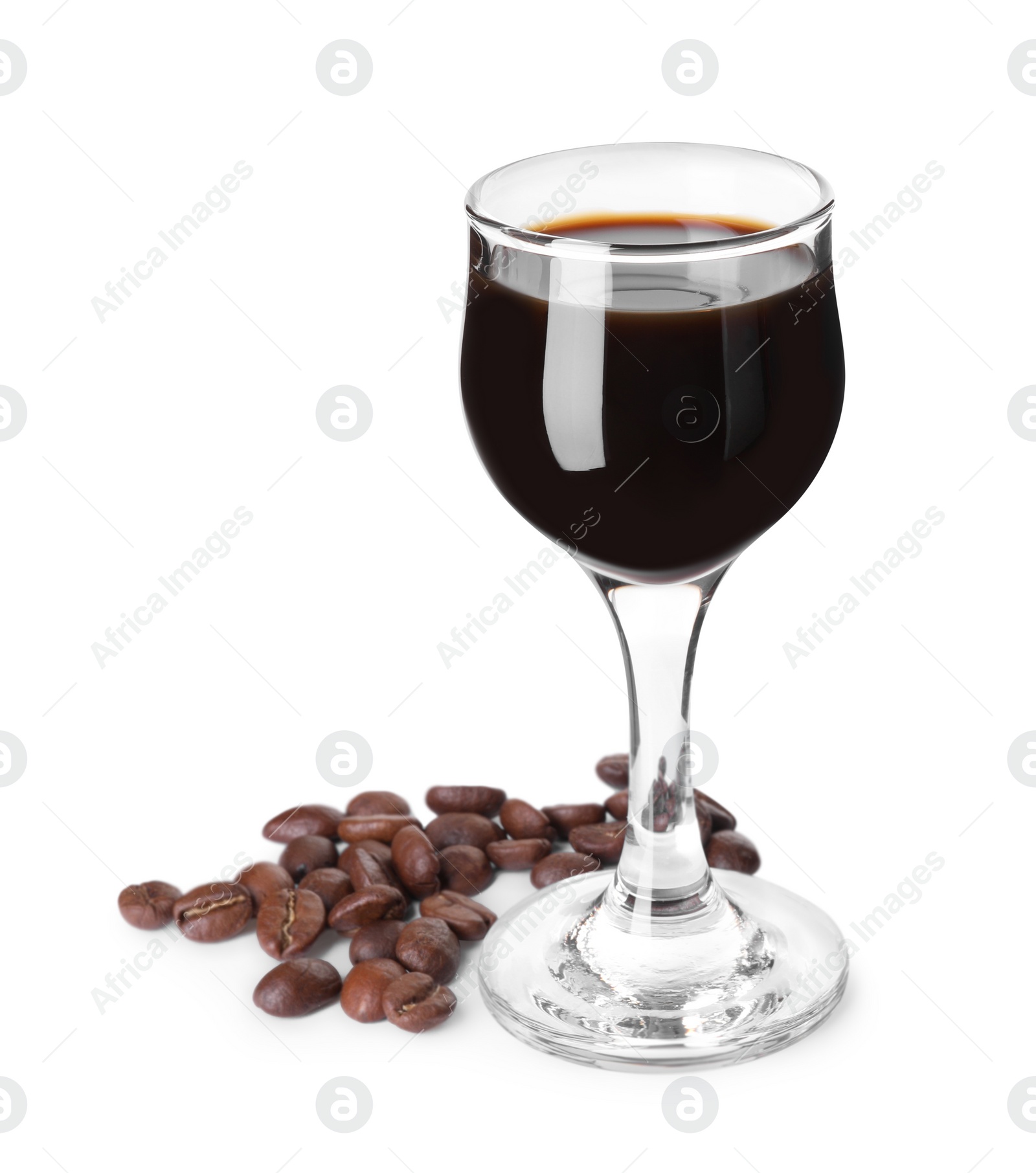 Photo of Shot glass with coffee liqueur and beans isolated on white