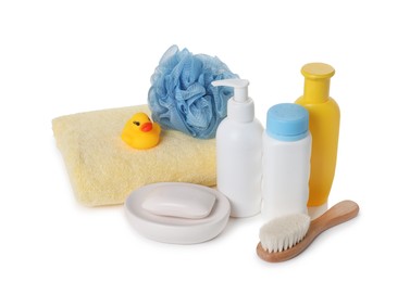 Baby cosmetic products, bath duck, brush and towel isolated on white