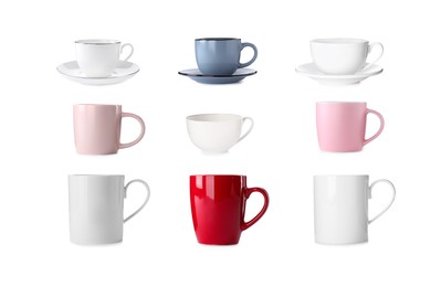 Image of Set with different beautiful cups on white background