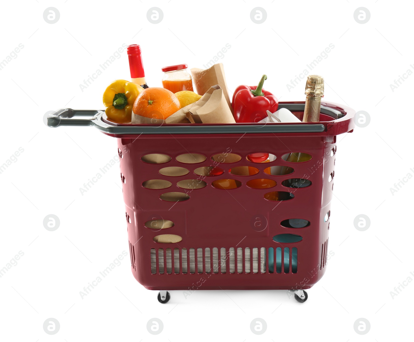 Photo of Shopping basket full of different products isolated on white