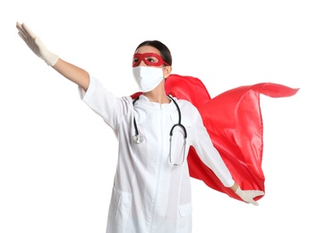 Photo of Doctor dressed as superhero posing on white background. Concept of medical workers fighting with COVID-19