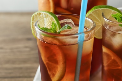 Glasses of delicious refreshing iced tea, closeup