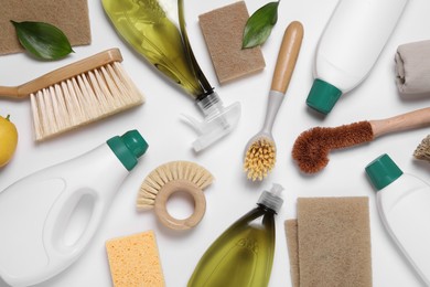 Photo of Flat lay composition with different cleaning supplies on white background