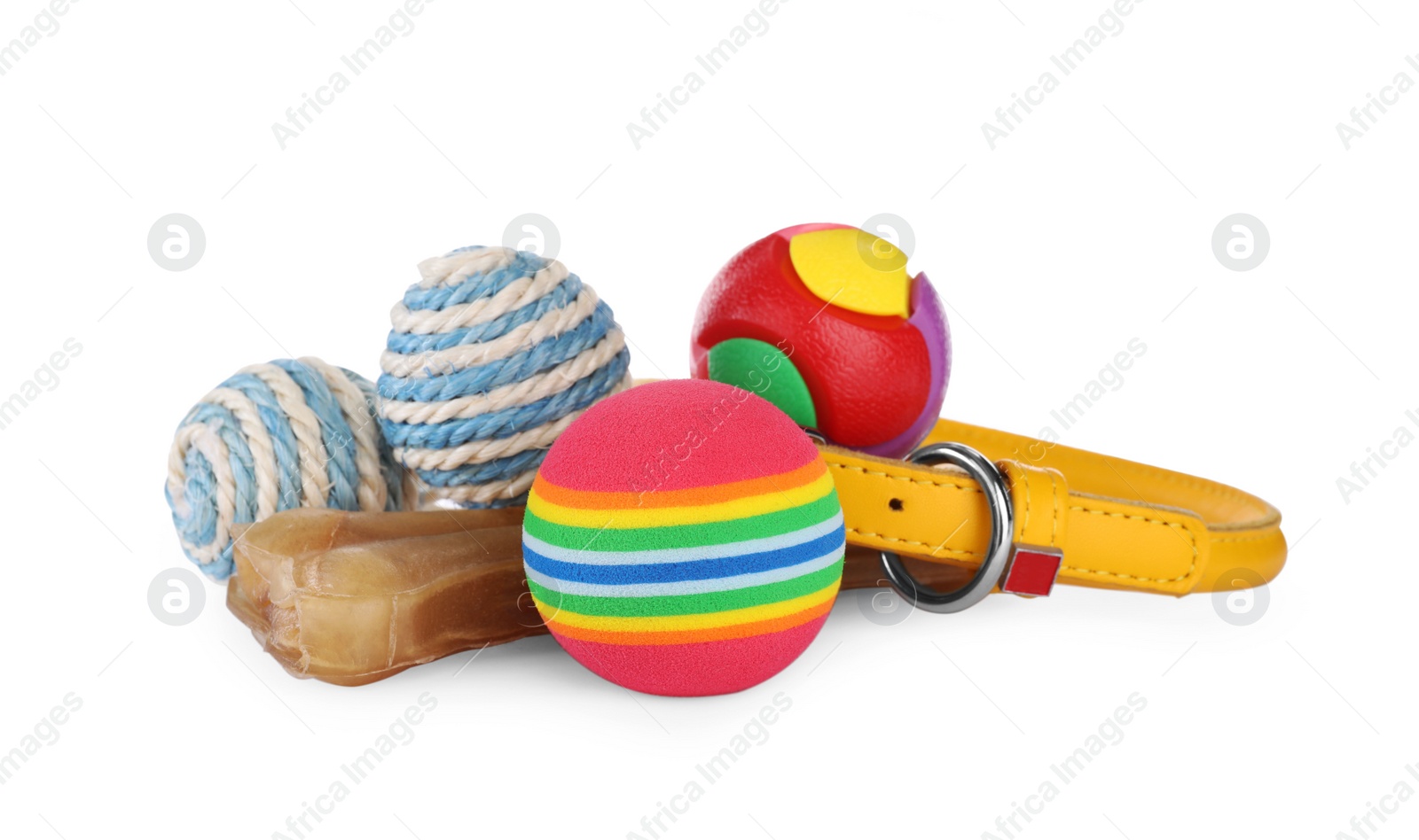 Photo of Pet toys, dog treat and collar isolated on white