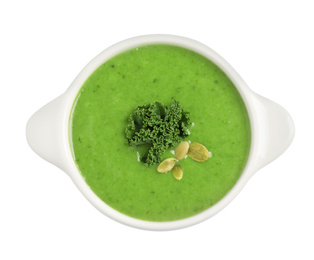Photo of Tasty kale soup with pumpkin seeds isolated on white, top view