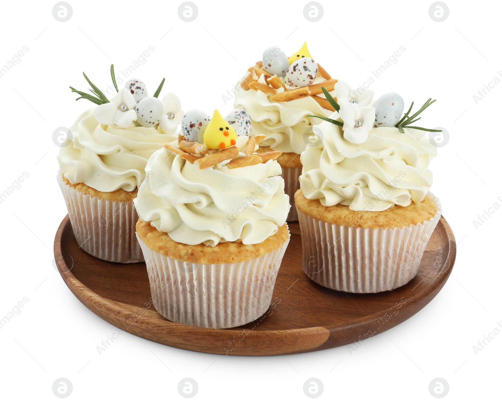 Photo of Tasty Easter cupcakes with vanilla cream isolated on white