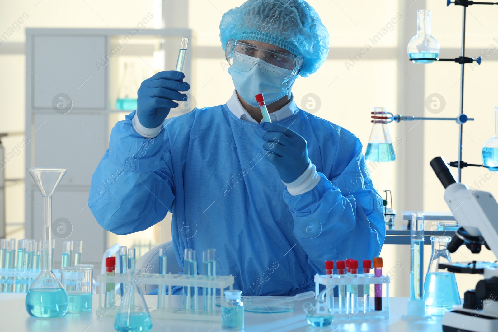 Photo of Scientist working with samples in laboratory. Medical research