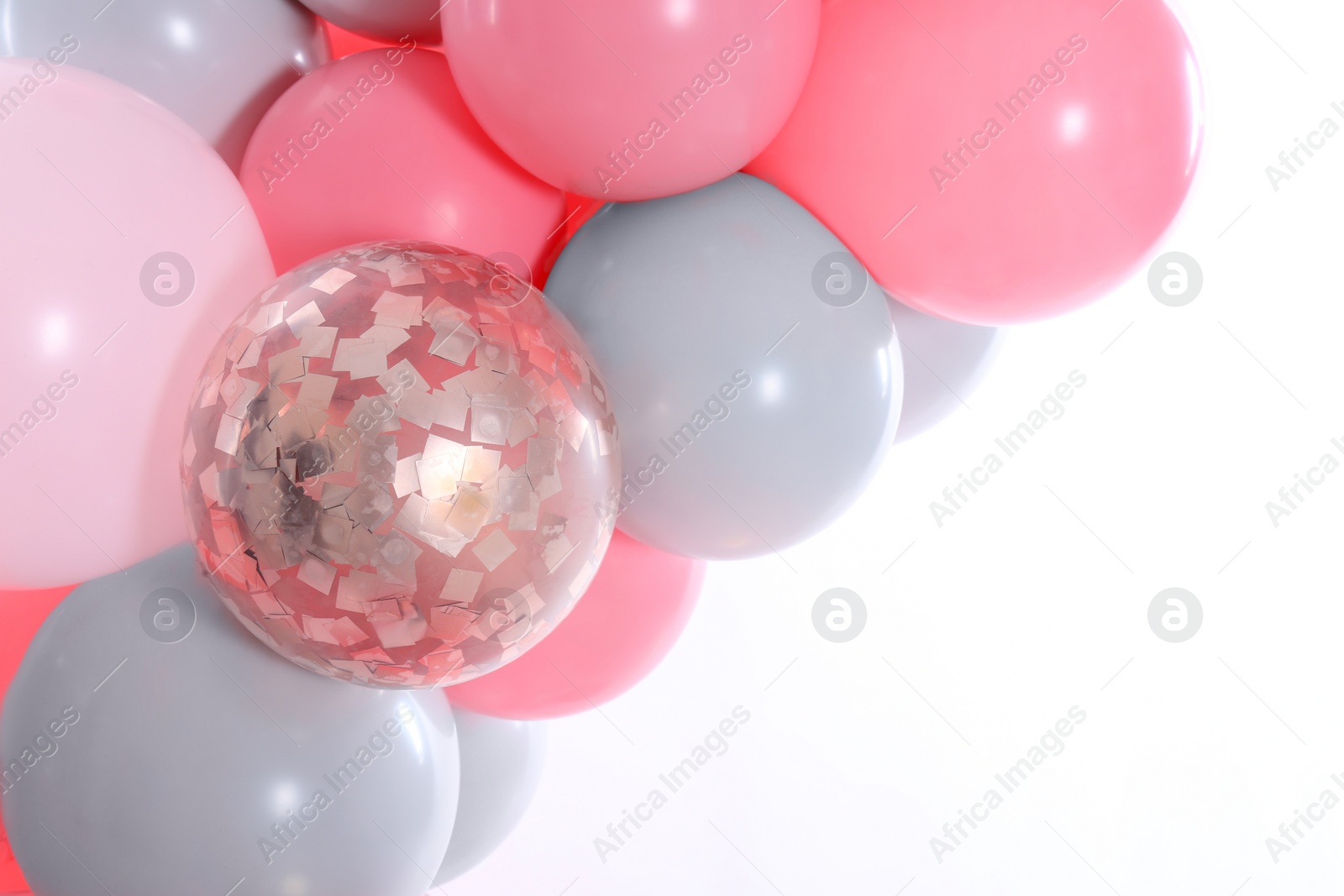 Photo of Beautiful colorful balloons on white background, closeup