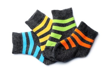 Cute child socks on white background, top view